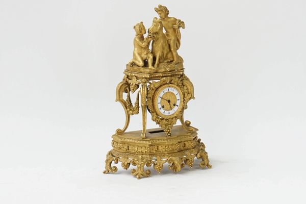 A Napoleon III gilt-bronze mantel clock