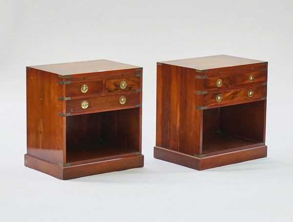 A pair of campaign style brass-bound yew wood bedside tables