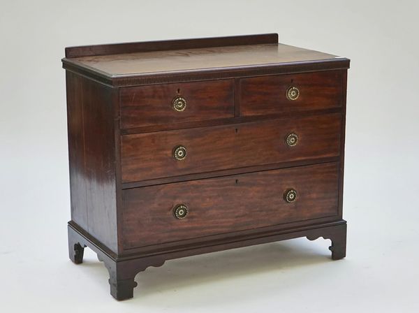 A mahogany chest with two short and two long drawers