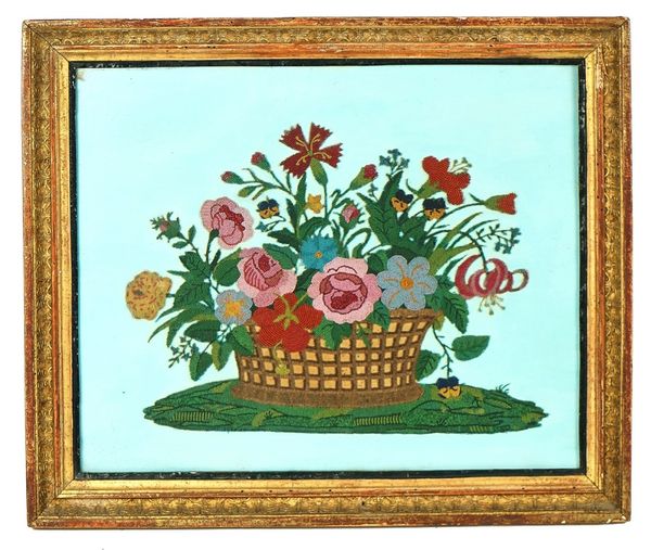 A VICTORIAN BEADWORK PICTURE OF A FLOWER-FILLED BASKET