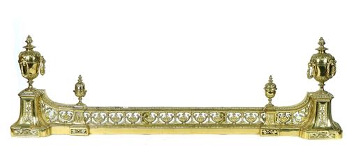 A FRENCH LOUIS XVI STYLE GILT BRASS ADJUSTABLE FENDER