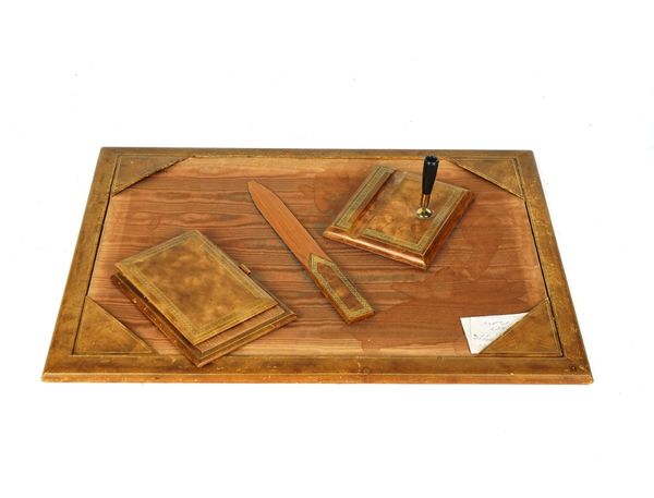 FIVE GILT TOOLED LEATHER MOUNTED DESK ACCESSORIES