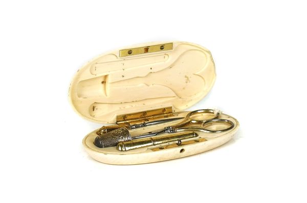 AN IVORY ETUI WITH SILVER-GILT MOUNTED ACCESSORIES
