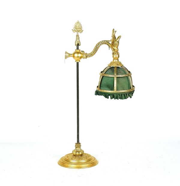 A FRENCH EMPIRE STYLE GILT-METAL ADJUSTABLE READING LIGHT