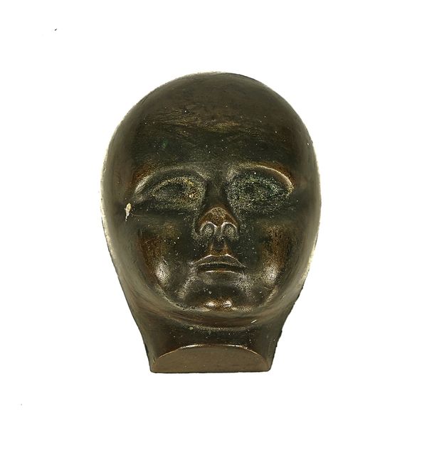 A BRONZE BUST OF A CHILD'S HEAD