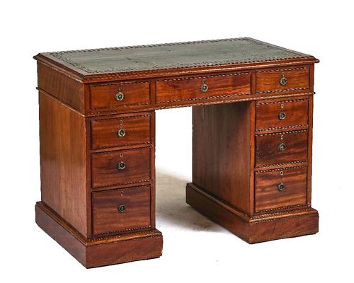 A 19TH-CENTURY MAHOGANY PEDESTAL DESK