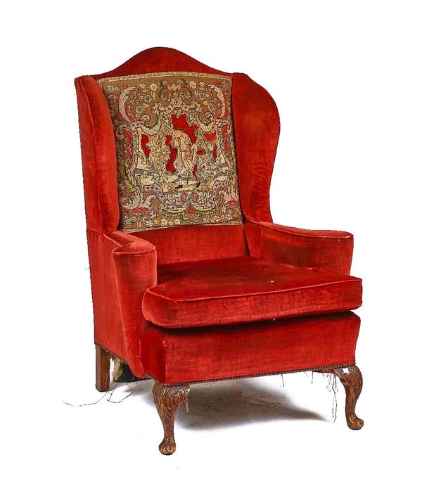 A GEORGE II STYLE WINGBACK ARMCHAIR