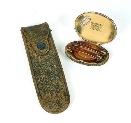 AN OVAL SHAGREEN CASE WITH A PAIR OF FOLDING SPECTACLES AND A PAIR OF STEEL FRAMED SPECTACLES (3)
