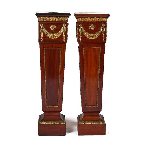 A PAIR OF GILT METAL-MOUNTED MAHOGANY PEDESTALS, CIRCA 1900 (2)