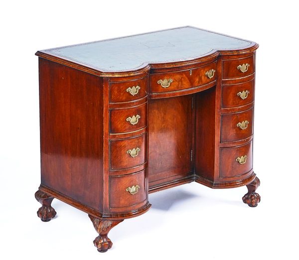 A QUEEN ANNE STYLE WALNUT KNEE-HOLE WRITING DESK