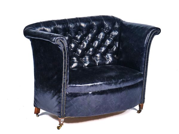 AN EARLY 20TH CENTURY STUDDED BLACK LEATHERED UPHOLSTERED HIGH BACK SOFA