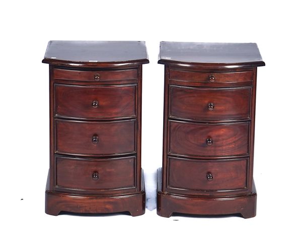 A PAIR OF 20TH CENTURY HARDWOOD BOWFRONT BEDSIDE TABLES (2)