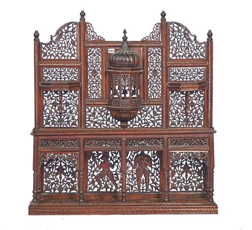 A  LATE 19TH / EARLY 20TH CENTURY NORTH INDIAN PIERCED AND CARVED HARDWOOD WALL SHELF