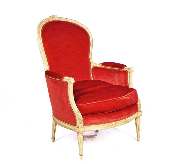 A FRENCH TRANSITIONAL STYLE CREAM PAINTED SPOON BACK ARMCHAIR