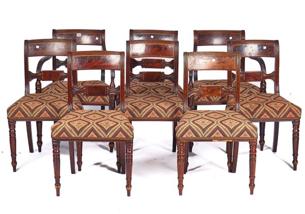 A SET OF EIGHT REGENCY BRASS INLAID MAHOGANY DINING CHAIRS (8)