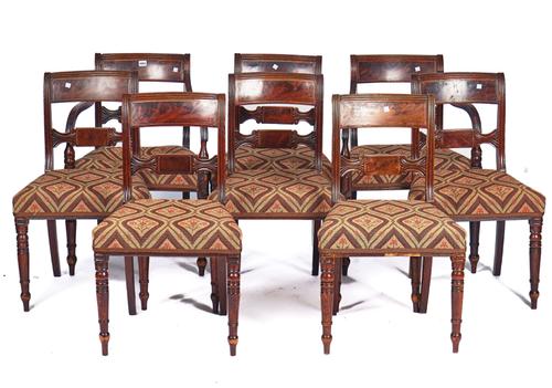 A SET OF EIGHT REGENCY BRASS INLAID MAHOGANY DINING CHAIRS (8)