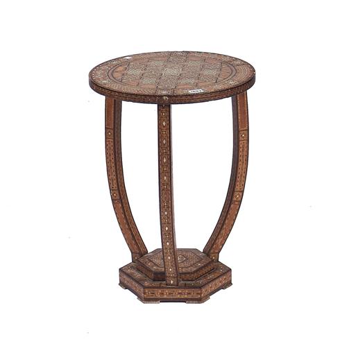 A PERSIAN GEOMETRIC SPECIMEN WOOD AND MOTHER-OF-PEARL INLAID CIRCULAR OCCASIONAL TABLE