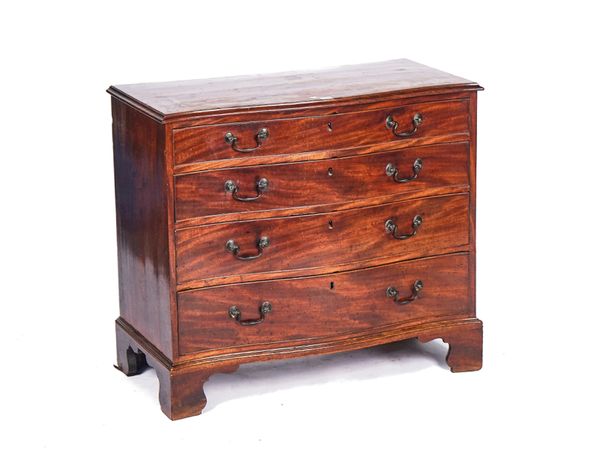 A GEORGE III SERPENTINE MAHOGANY CHEST