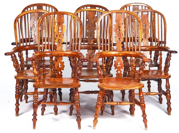 A SET OF EIGHT EARLY 19TH CENTURY YEW AND ELM WINDSOR CHAIRS (8)