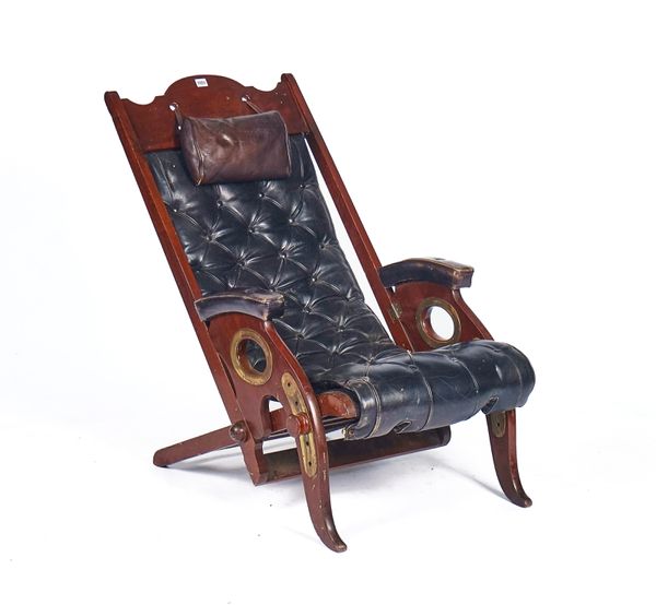 A CAMPAIGN STYLE BRASS MOUNTED MAHOGANY ARMCHAIR