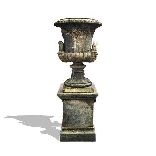 A LARGE RECONSTITUTED STONE URN