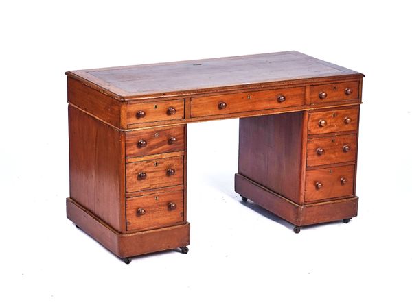 A 19TH CENTURY MAHOGANY PEDESTAL DESK