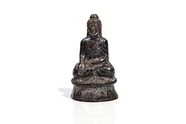 A SOUTH EAST ASIAN SILVER- COLOURED METAL BUDDHA