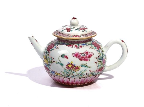 A CHINESE FAMILLE ROSE TEA POT AND MATCHED COVER