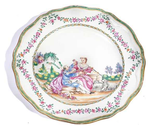 A CHINESE EXPORT FAMILLE-ROSE EUROPEAN SUBJECT PLATE