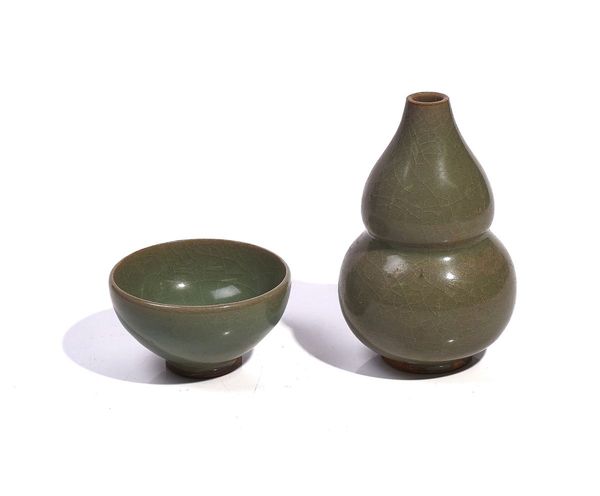 A CHINESE CELADON GLAZED GOURD VASE