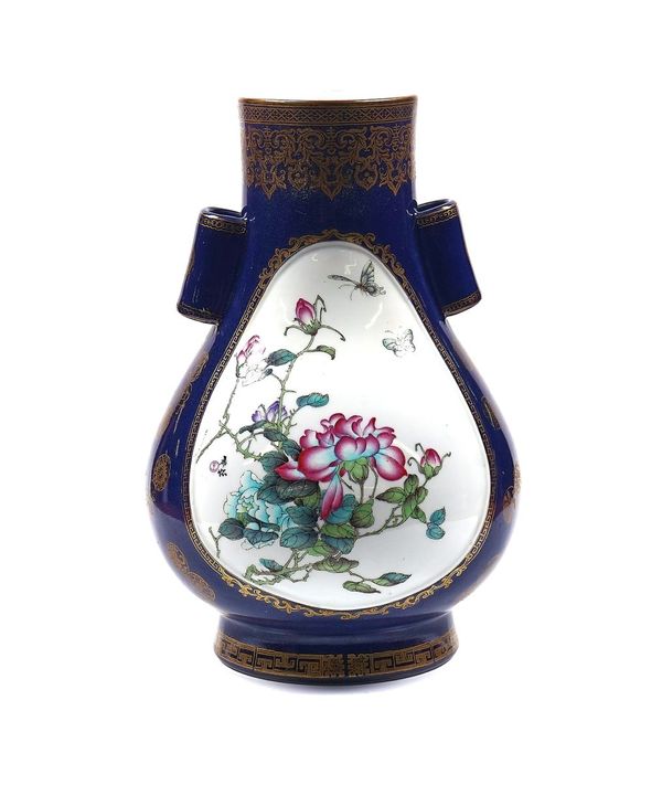 A LARGE CHINESE FAMILLE-ROSE POWDER-BLUE GROUND PEAR SHAPED VASE