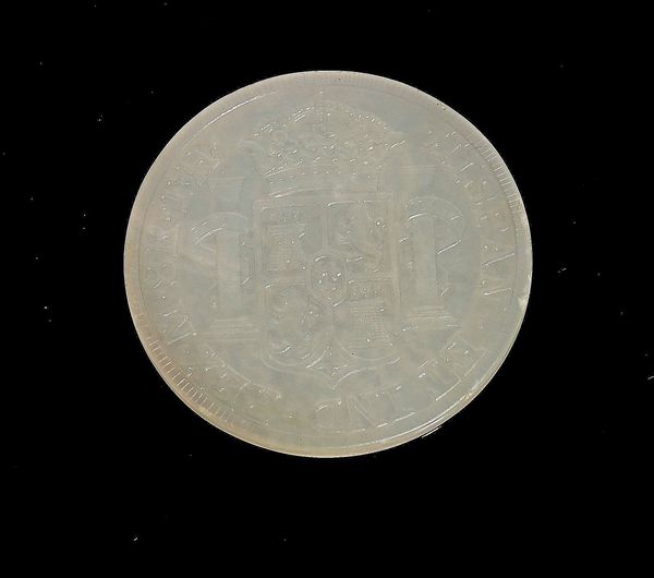 A CHINESE WHITE JADE `COIN' PLAQUE