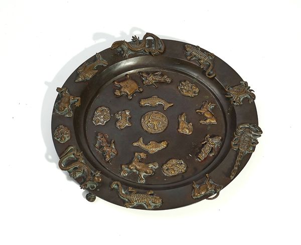 AN INDIAN BRONZE FOOTED DISH