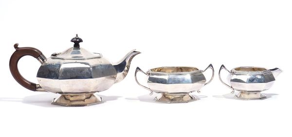 A SILVER THREE PIECE TEA SET