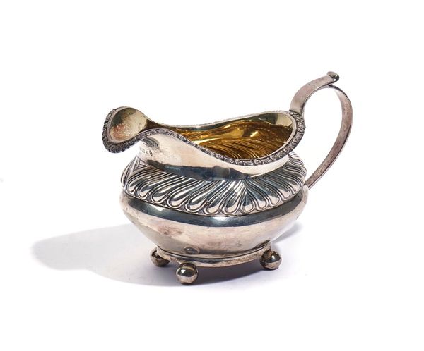 A GEORGE IV SILVER MILK JUG