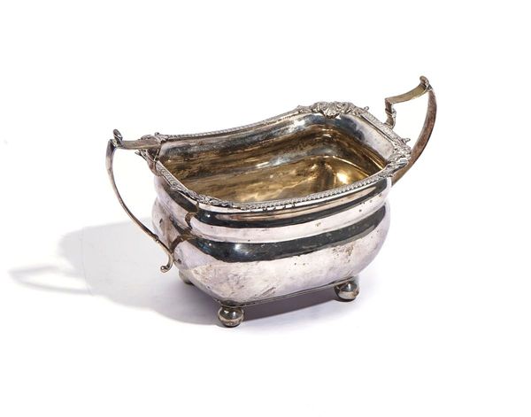 A GEORGE III IRISH SILVER TWIN HANDLED SUGAR BOWL