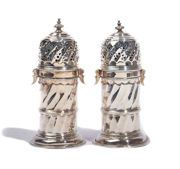 A PAIR OF VICTORIAN BRITANNIA STANDARD SILVER SUGAR CASTERS, (2)