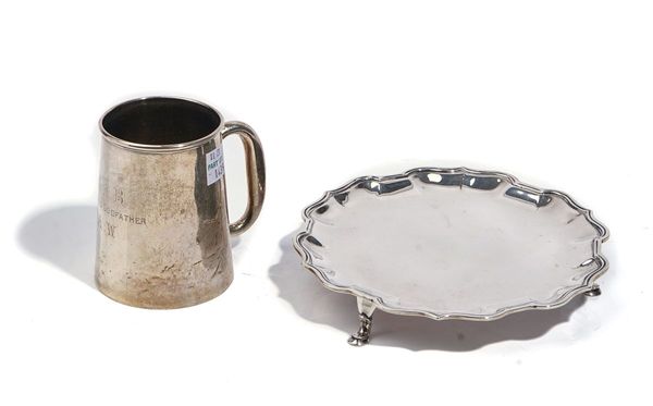 A SILVER WAITER AND A SILVER MUG, (2)