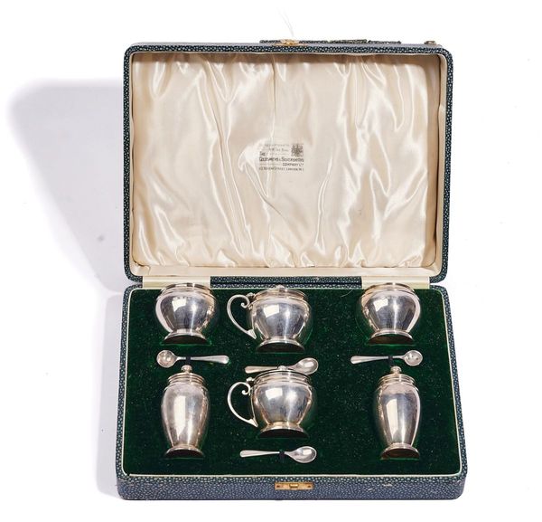 A SILVER SIX-PIECE CRUET SET