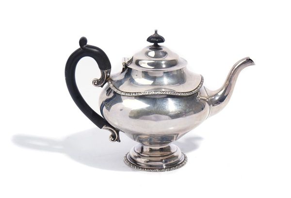 A SILVER THREE PIECE TEA SET