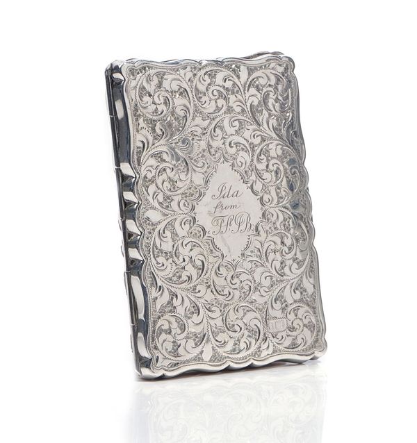 A VICTORIAN SILVER SHAPED RECTANGULAR VISITING CARD WALLET