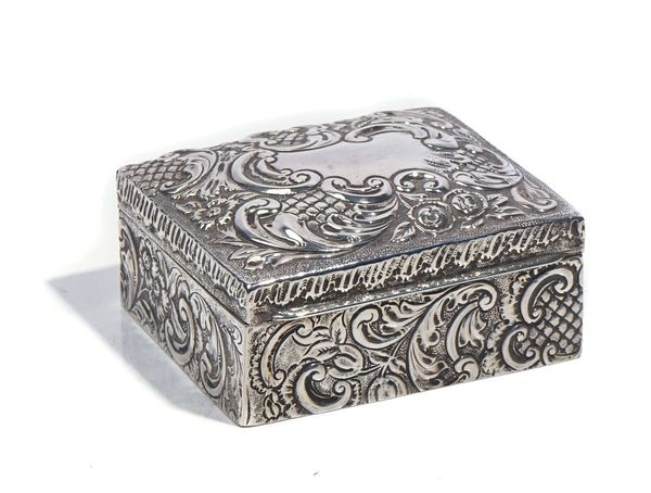 A SILVER RECTANGULAR TABLE CIGARETTE BOX