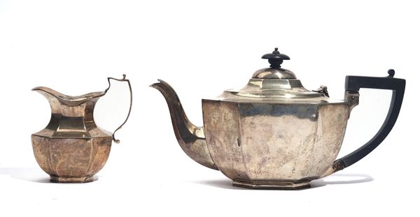 A SILVER TEAPOT AND A SILVER MILK JUG (2)