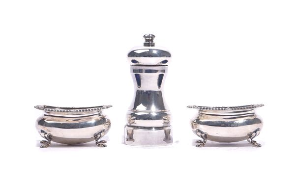 A PAIR OF SILVER SALTS AND A SALT MILL (3)