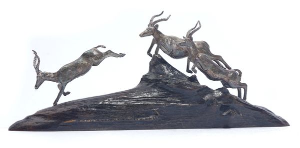 A PATRICK MAVROS SILVER MODEL OF A GROUP OF  THREE ANTELOPES