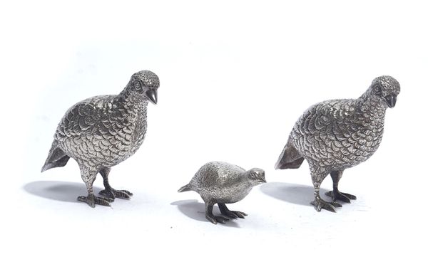 A PAIR OF SILVER MODELS OF BIRDS AND ONE SMALLER (3)