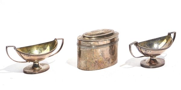 A SILVER TEA CADDY AND TWO SILVER SALTS (3)