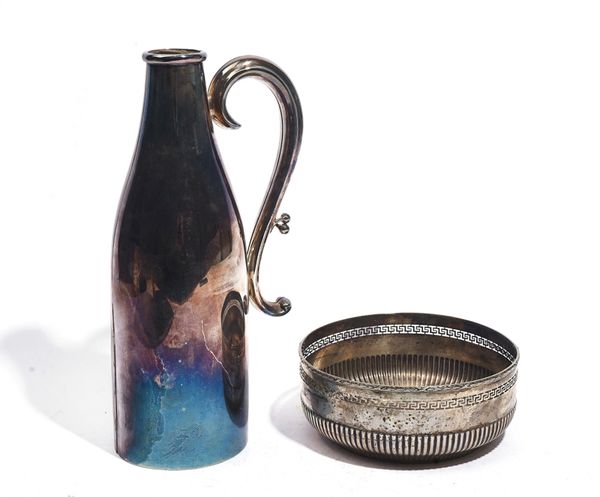 A GERMAN BOWL AND A PLATED WINE BOTTLE HOLDER (2)