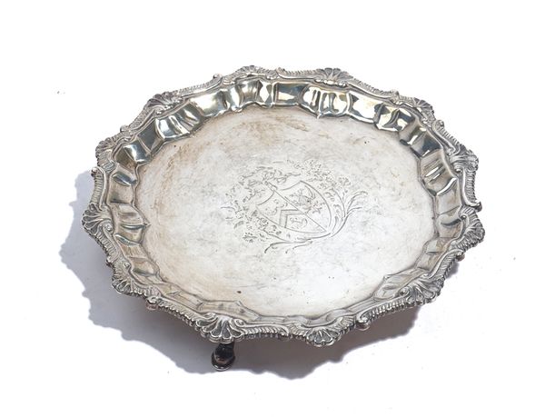 A SILVER SHAPED CIRCULAR WAITER