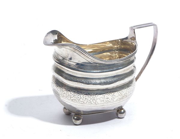 A GEORGE III SILVER MILK JUG